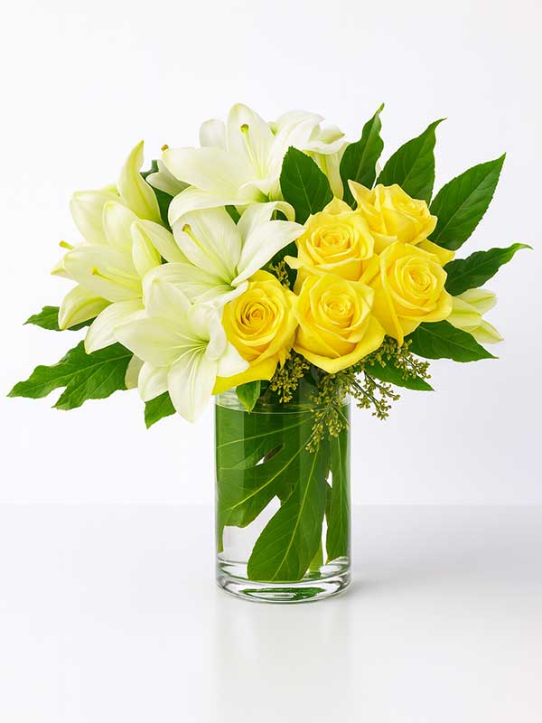 Yellow Roses & Lilies in a Glass Vase